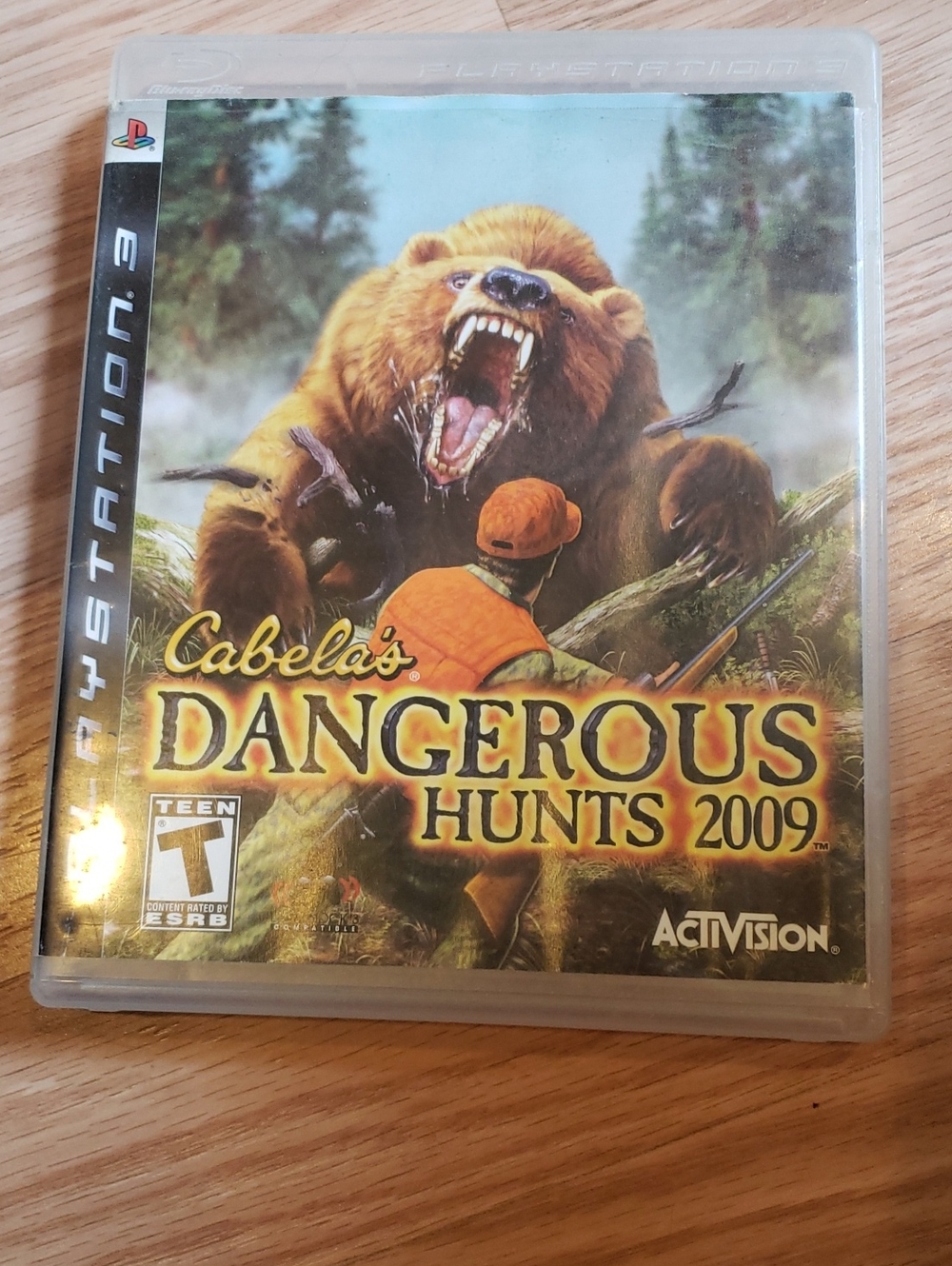 Cabela's Dangerous Hunts 2009 PlayStation 3 Cover - Orange, Brown, Green